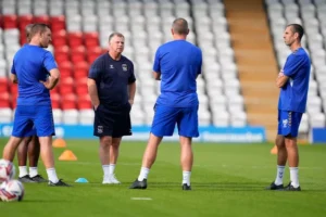 Mark Delaney*: A former Aston Villa player and current Under-18s coach at Coventry City, Delaney has emerged as a candidate to fill Adi Viveash’s role as head coach at Coventry City ¹.